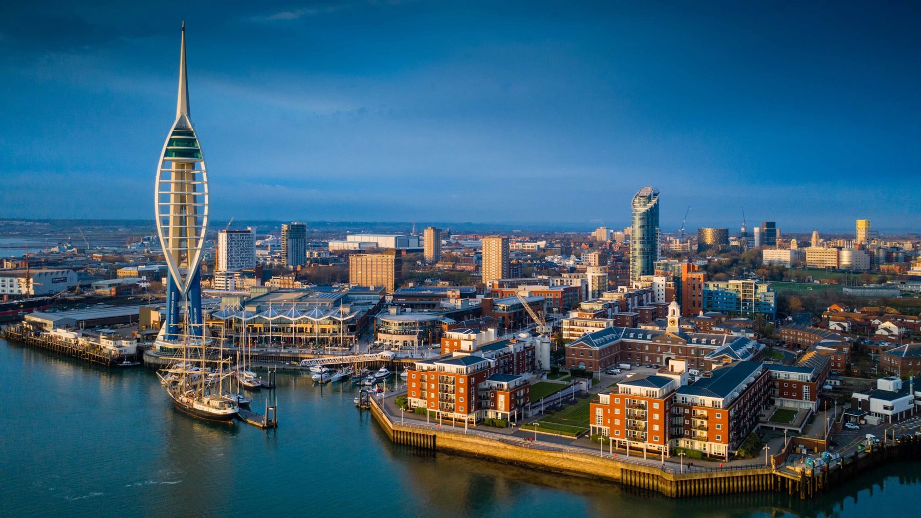 Gunwharf Quays waterfront and Spinnaker Tower, Portsmouth — moments from our Queen Street clinic